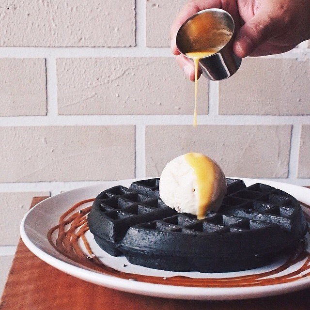 charcoal waffles with salted egg sauce